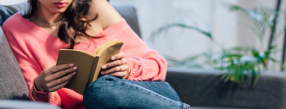 woman reading fiction.