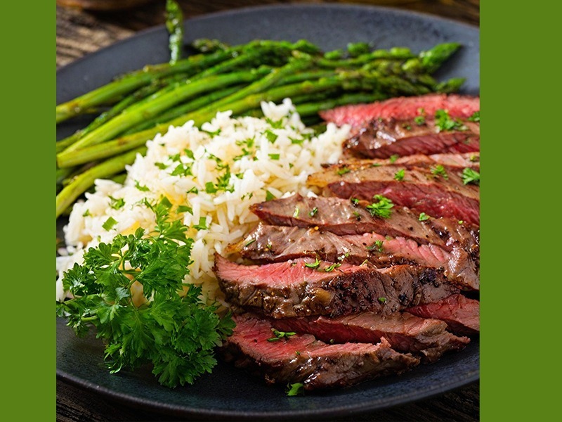 Flank steak, asparagus and rice pilaf cooked naturally.