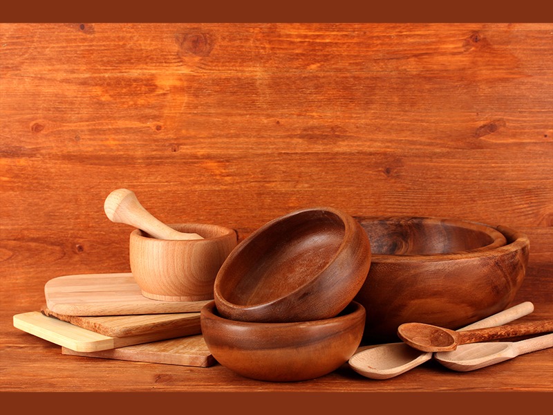 Wooden kitchen tools in a natural kitchen.