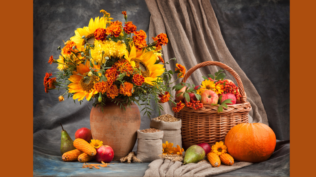 Autumn altar with candles, leaves, and journal symbolizing nature-based spirituality and gratitude.